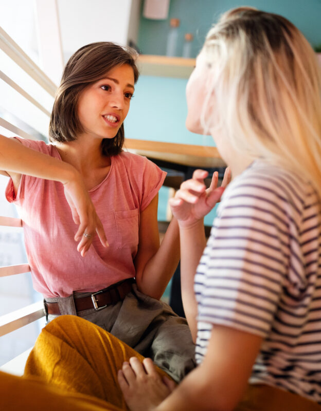 Two_Young_Women_Talking